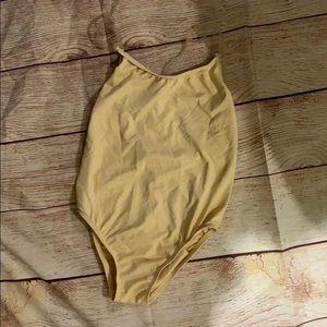Girls layering leotard for under costumes